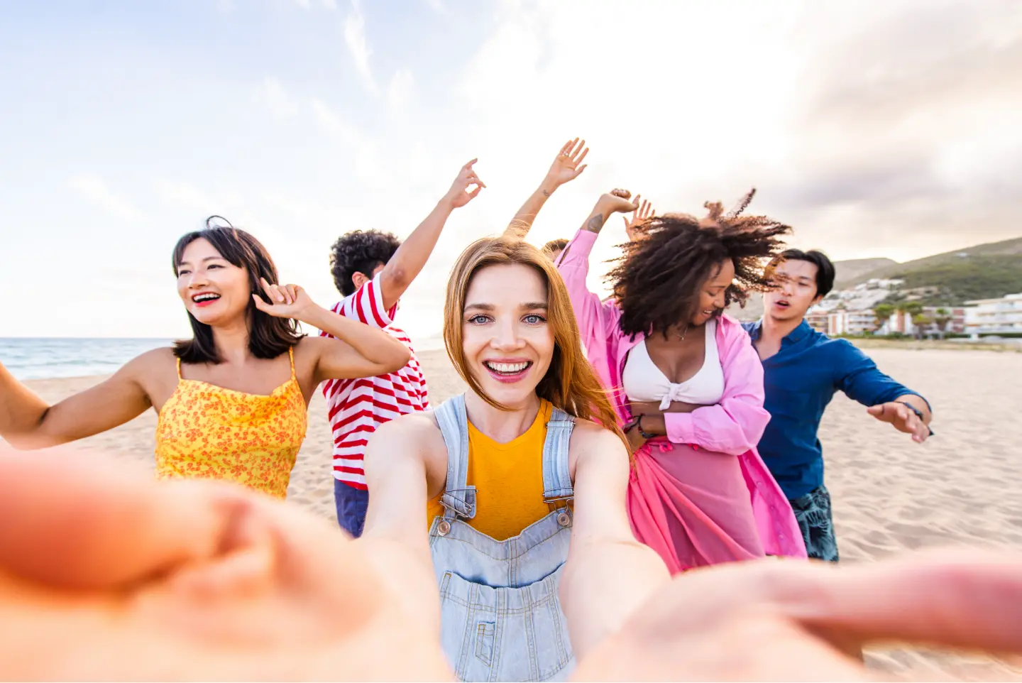 group of friends happy at the beach