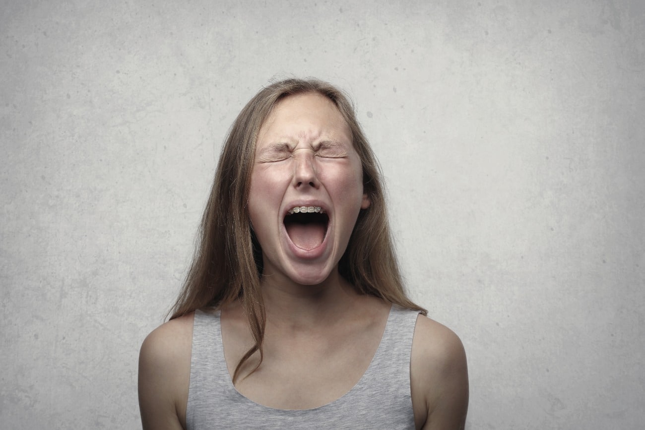 young woman screaming