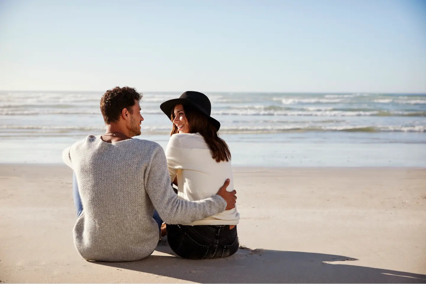 couple sitting at the beach