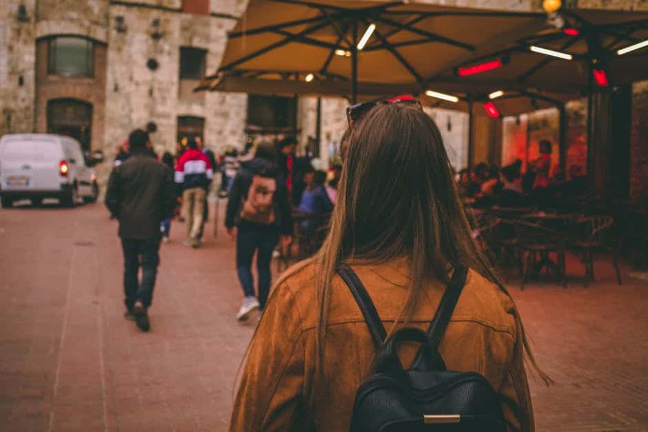 woman walking in a crowded area