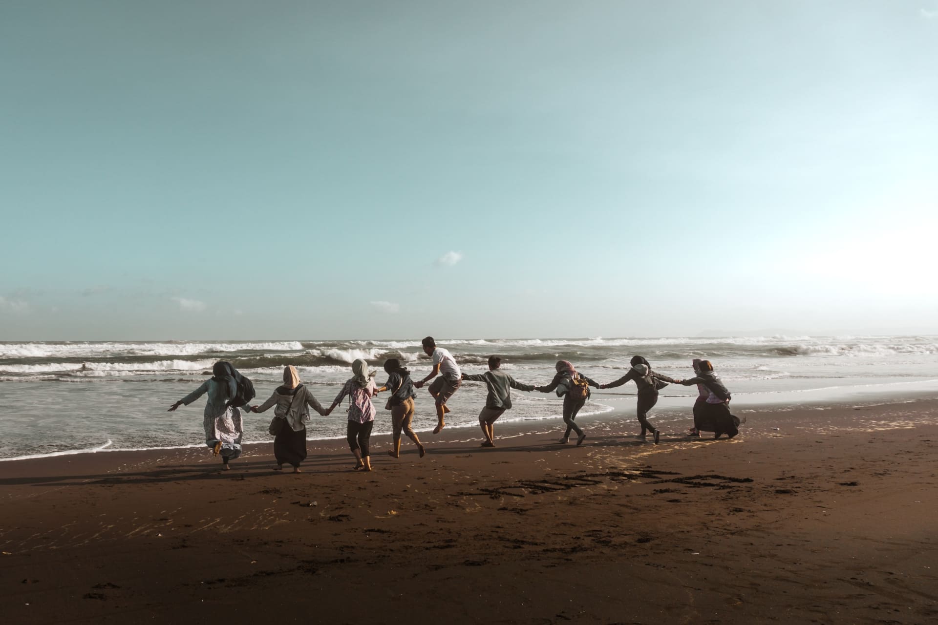 group of people together at the beach